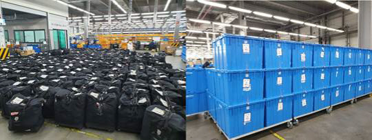 롯데면세점이 운송 수단 개선을 통해 연 400톤의 비닐캡 사용을 줄이겠다고 밝혔다. 사진은 기존 운송 행낭(왼쪽)과 개선 후 운송용기(오른쪽). <롯데면세점 제공>